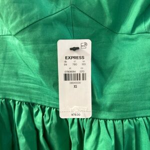 Express spaghetti strap short dress with pockets.  Size XS.